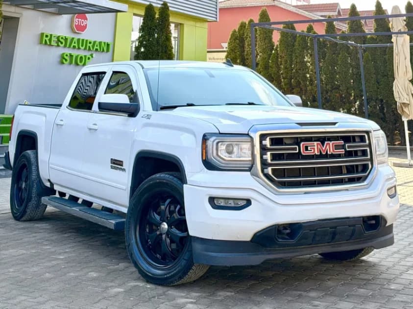 Imagine 1/8: GMC Sierra 4 x 4 V8 5.3 L Autoutilitara 6 locuri Inmatriculat RO | Preț: 18.700 EUR | Locație: Brașov, Brașov GMC Sierra 4 x 4 V8 5.3 L Autoutilitara 6 locuri Inmatriculat RO - anul 2016 - Brașov, Brașov - 18.700 EUR - imagine 1 din 8 - mașină second hand